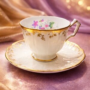 Elegant Gold and Floral Teacup and Saucer 
Aynsley bone china england
2451